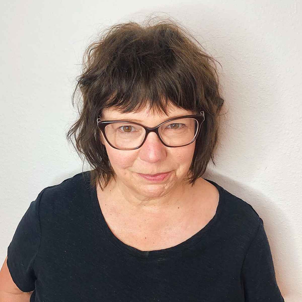 Chin-length shaggy cut with glasses