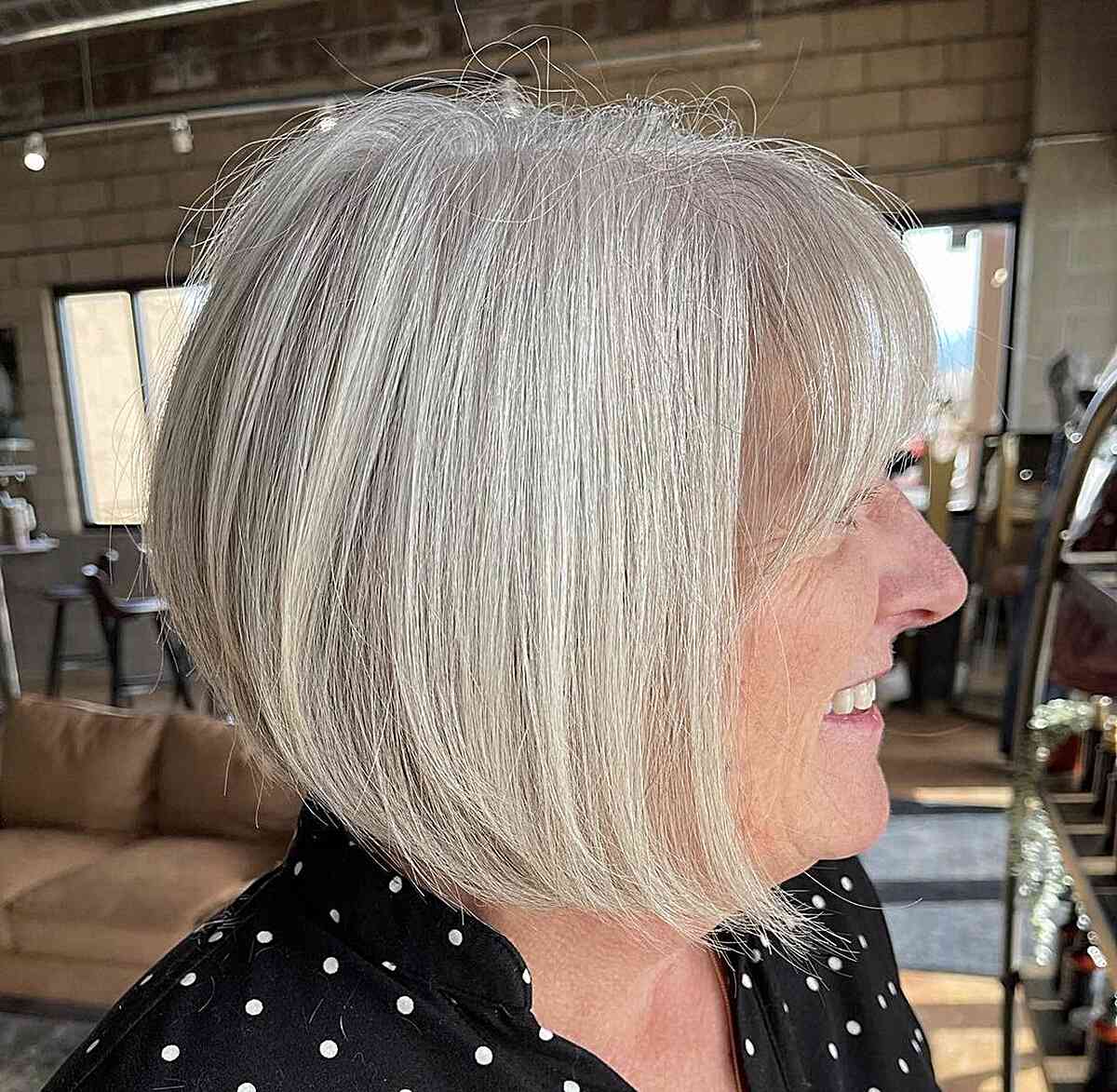 Chin-Length Silver Inverted Bob with Thin Bangs on Ladies Aged 60 and Up