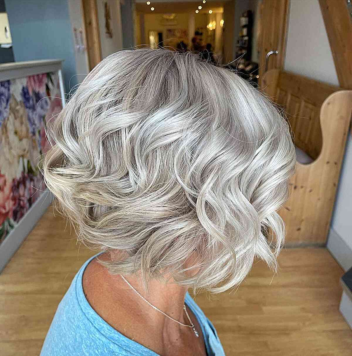 Chin-Length Short Wavy Hair with Silver Tones on Women Over 60
