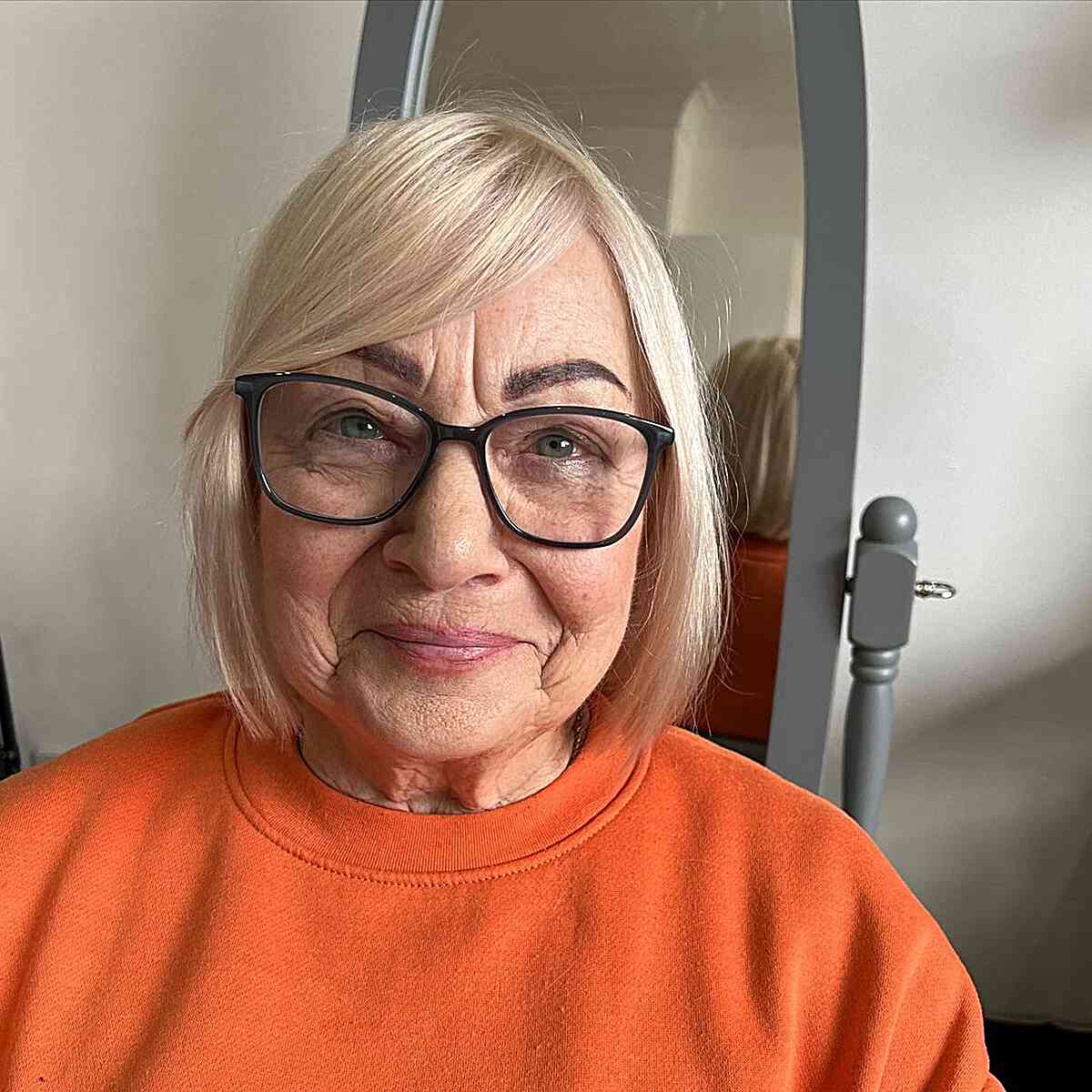 Chin-Length Straight Wispy Bob with Side Bangs for Older Ladies with Glasses