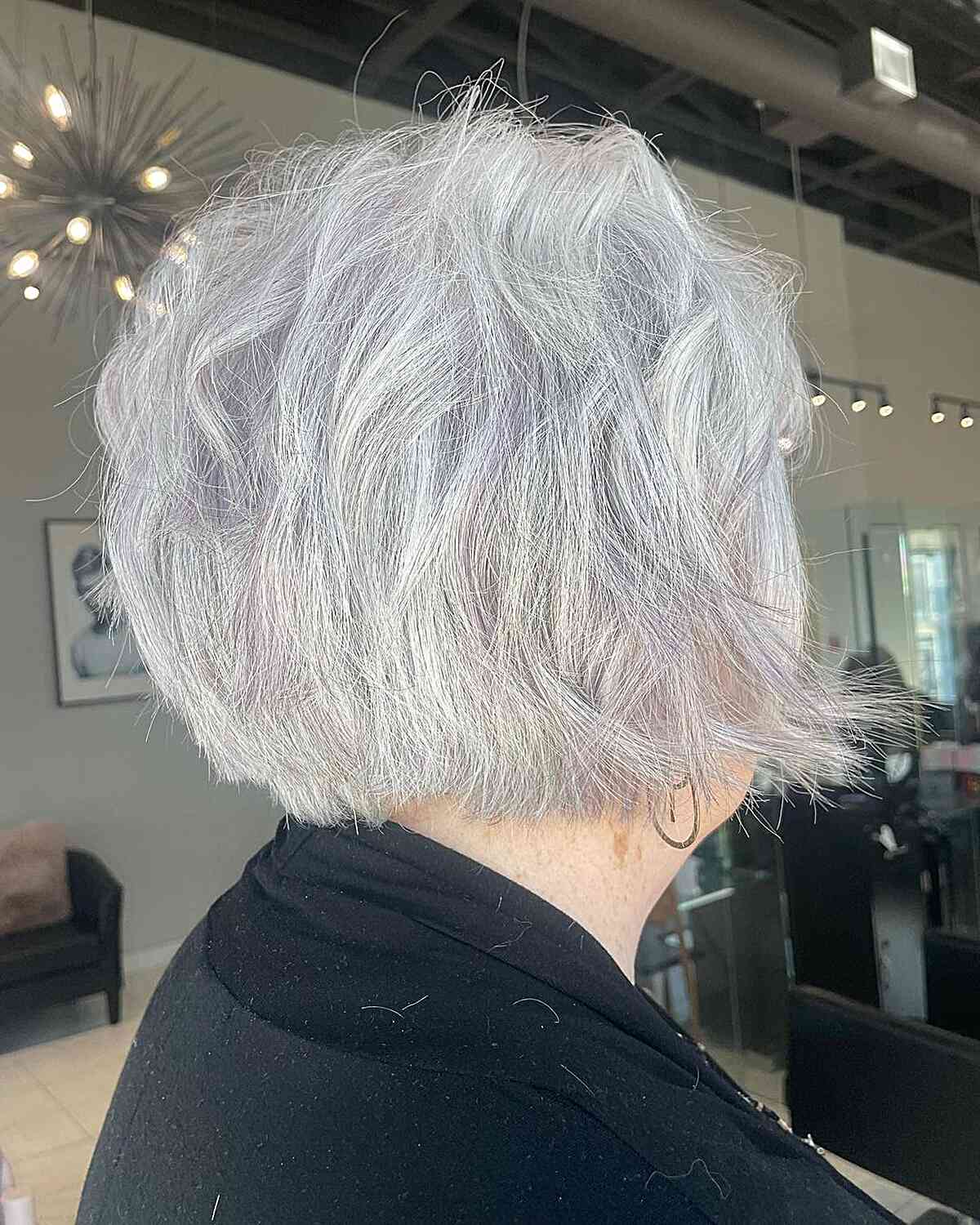Chin-Length Tousled Hair with Choppy Layers for Grey Hair on Women Over 60