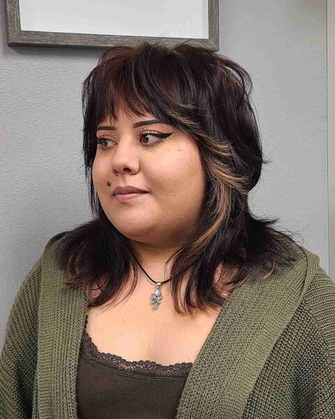 A Choppy Curtain Bangs for Round Face Shapes