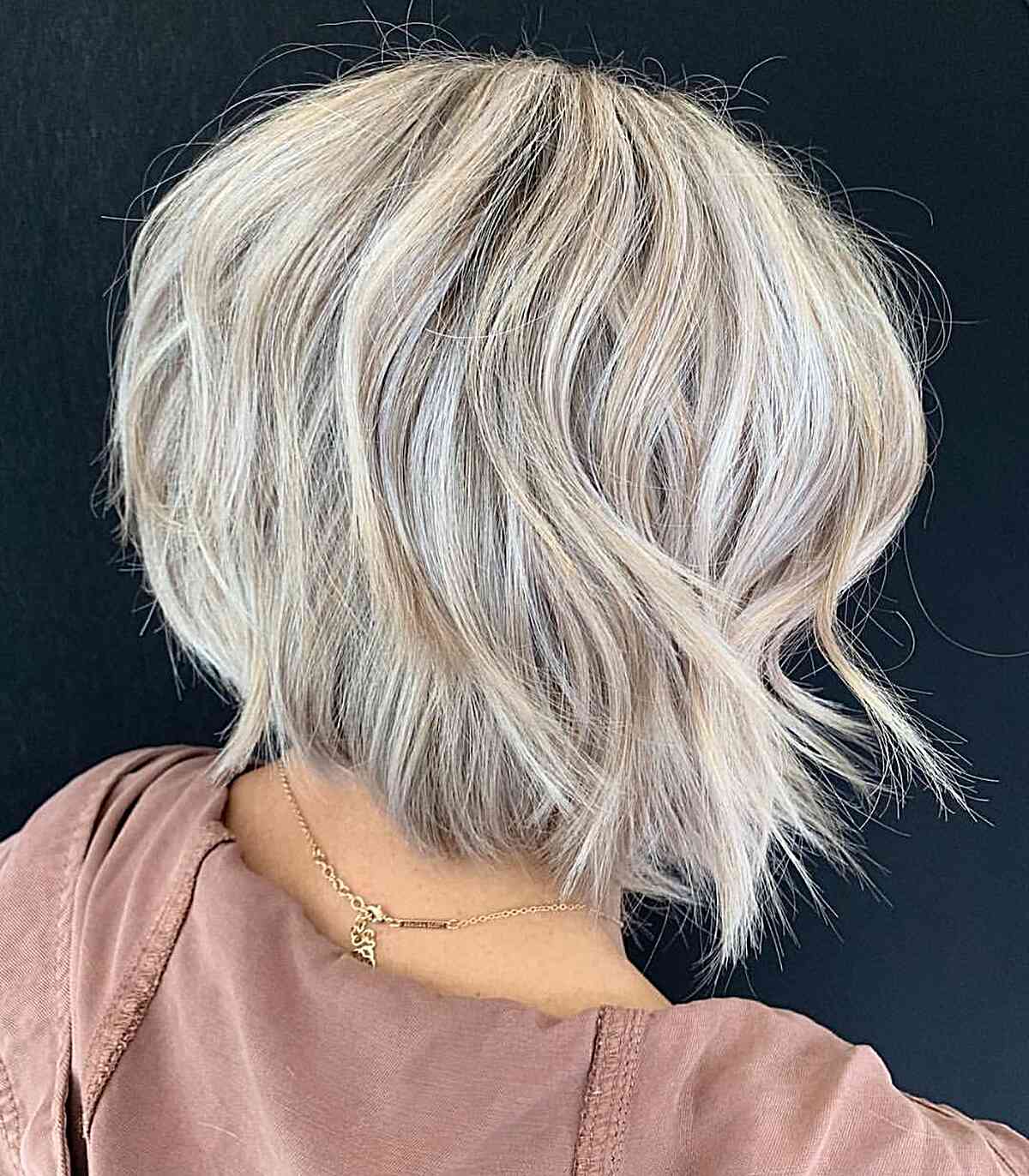 Neck-Grazing Choppy Inverted Bob Haircut with Swoopy Layers