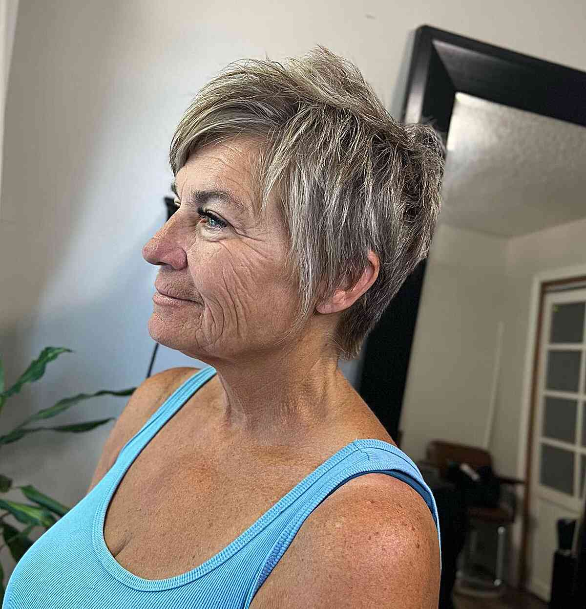 Choppy Layered Pixie Cut with Side Bangs for 60-Year-Old Women
