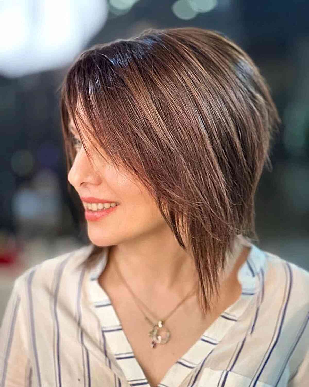 Choppy Long Wixie Cut for women with short hair and a brown balayage