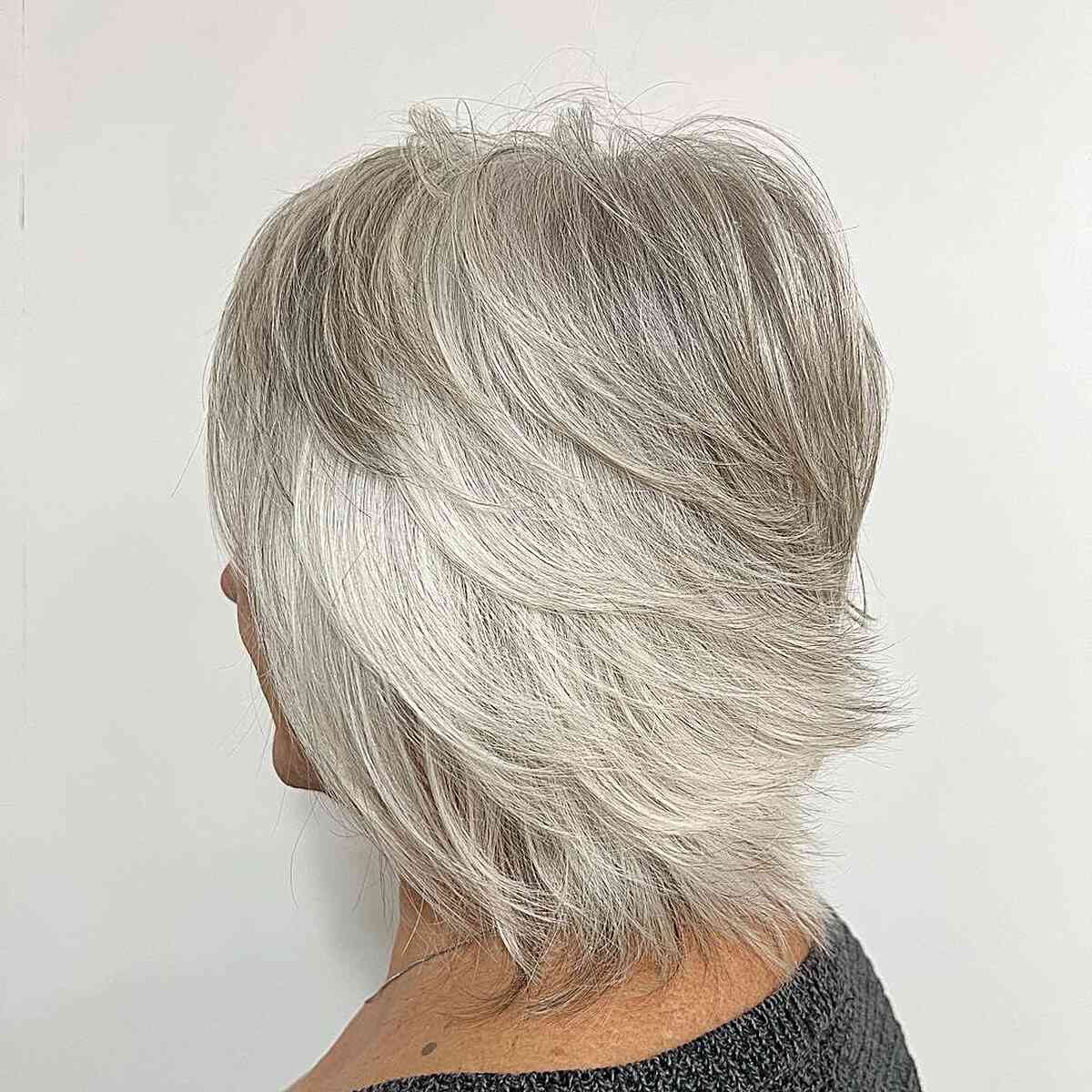 Choppy Multi-Layered Cut on Medium Short Silver Hair