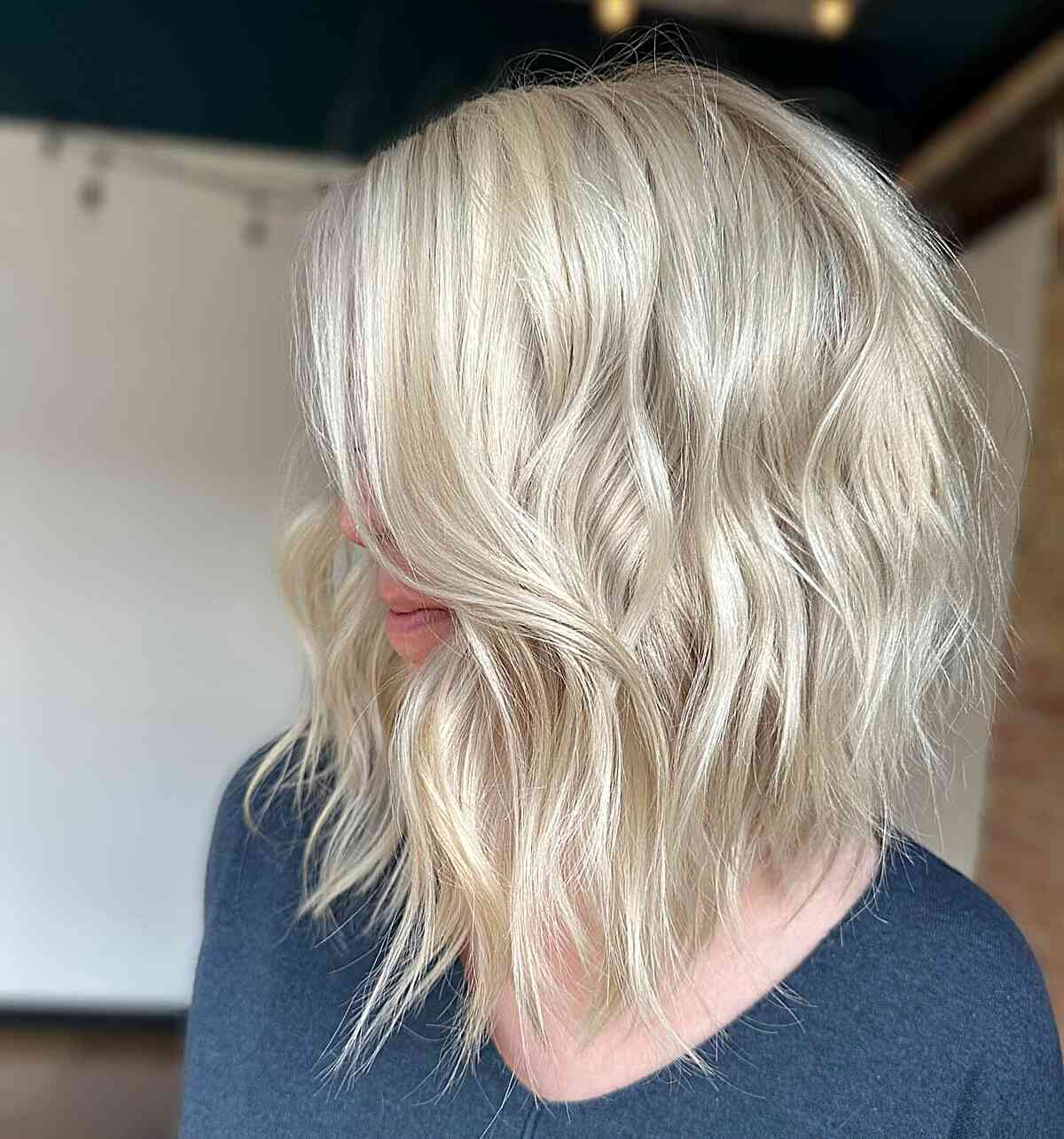 Collarbone-Length Choppy Platinum Inverted Lob with Soft Waves