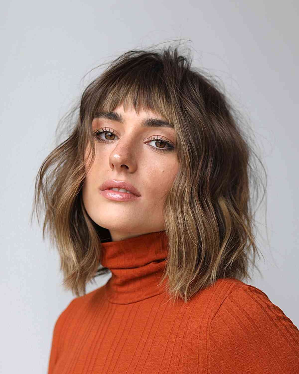 Choppy Short Bangs on a Textured Lob for girls with straight hair