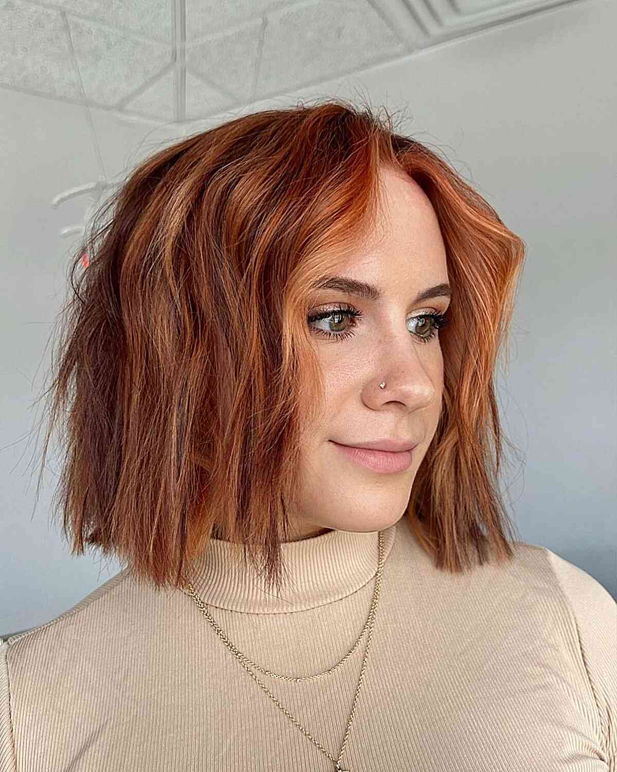 Middle-Parted Choppy Textured Copper Bob for Neck-Length Hair