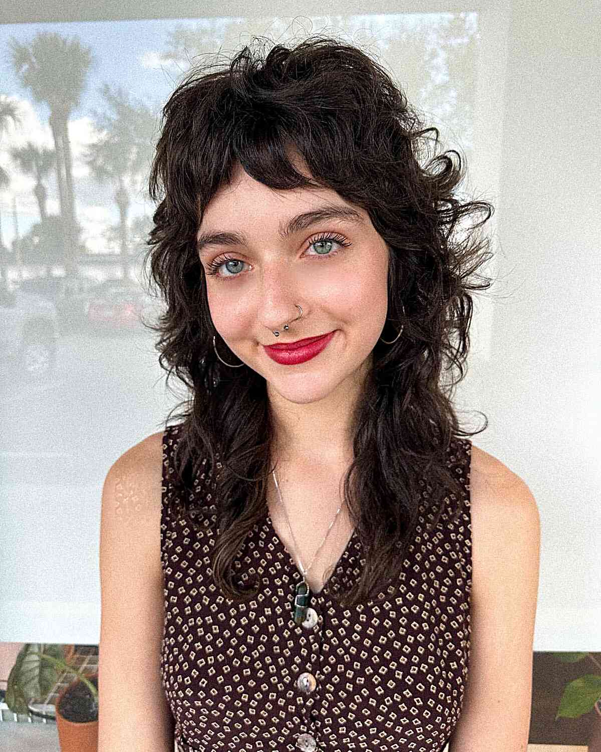 Shag with Choppy Bangs for Thick-Haired Women with Natural Curls and Waves