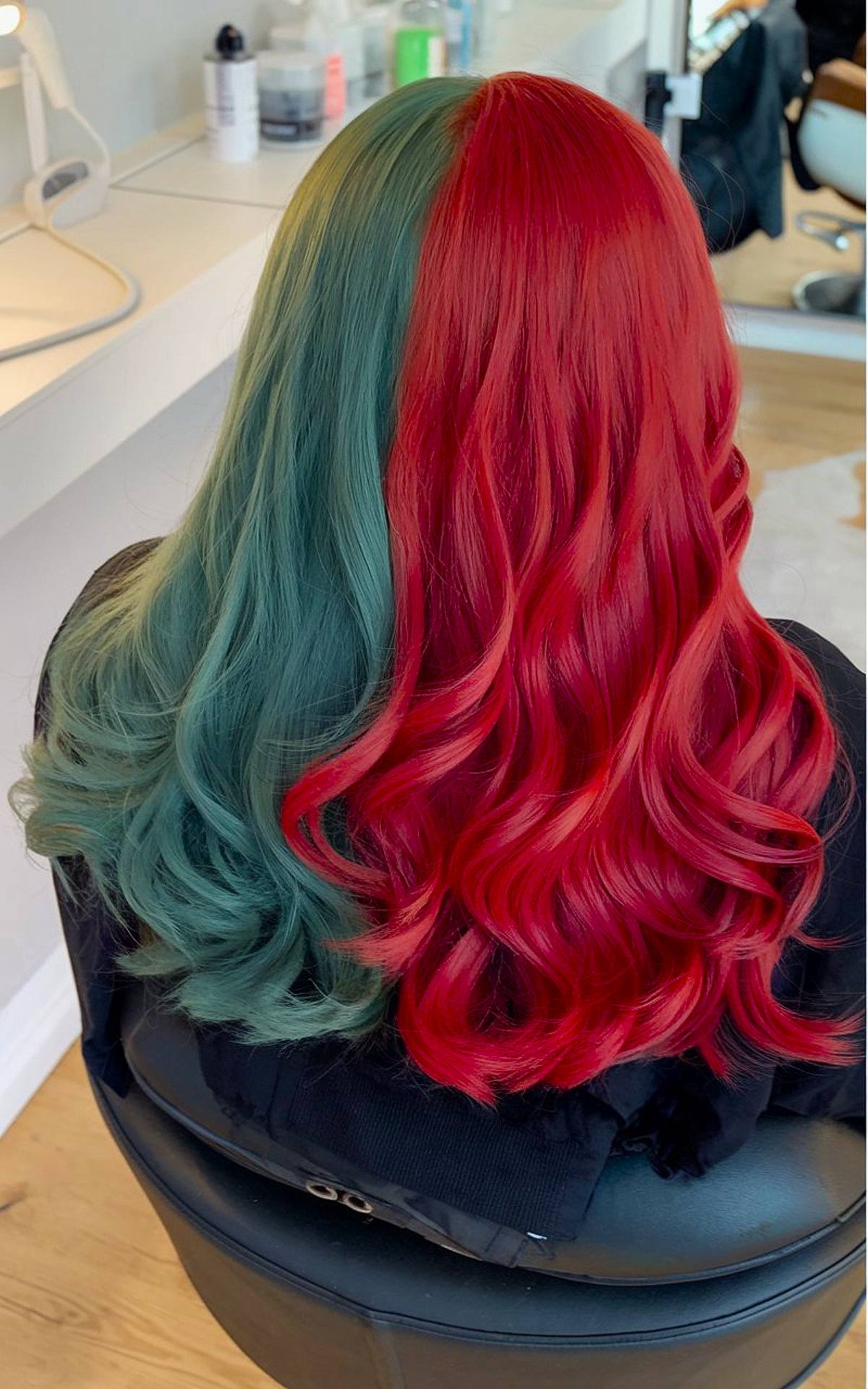 Christmas hair color idea with red and green split-dye waves