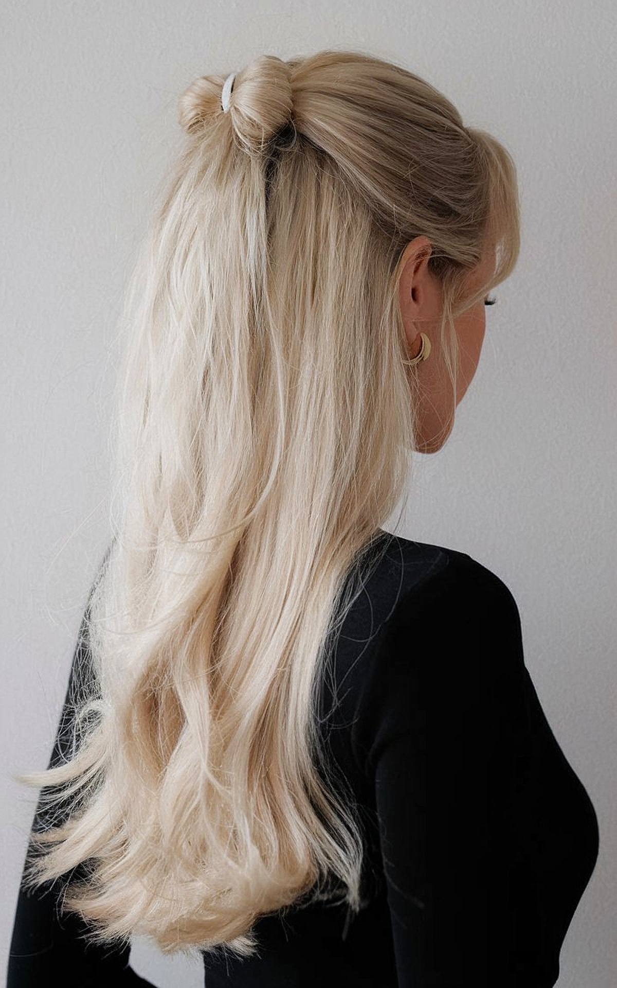 Half-up knot hairstyle for long hair at Christmas