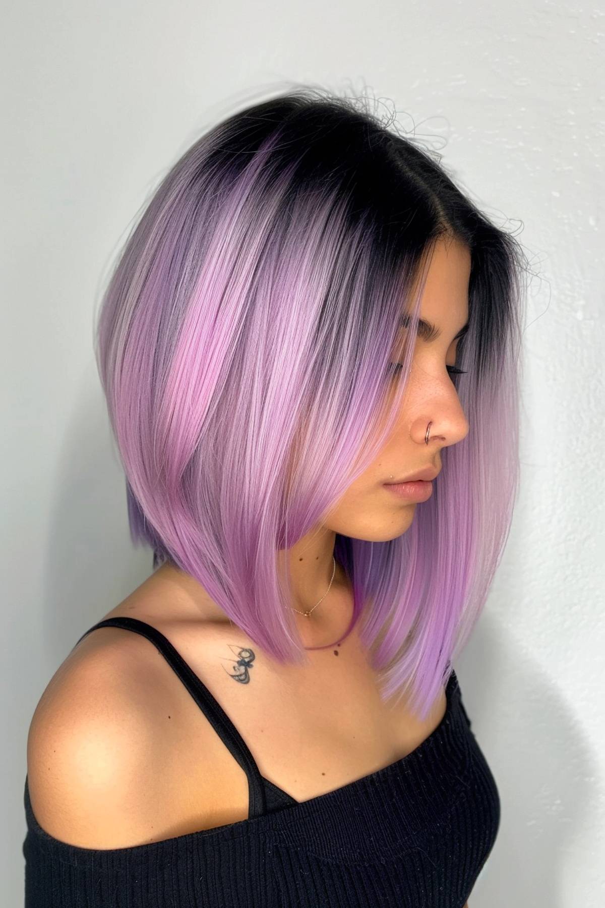 Angled Chromashift bob featuring a bold black-to-lavender gradient