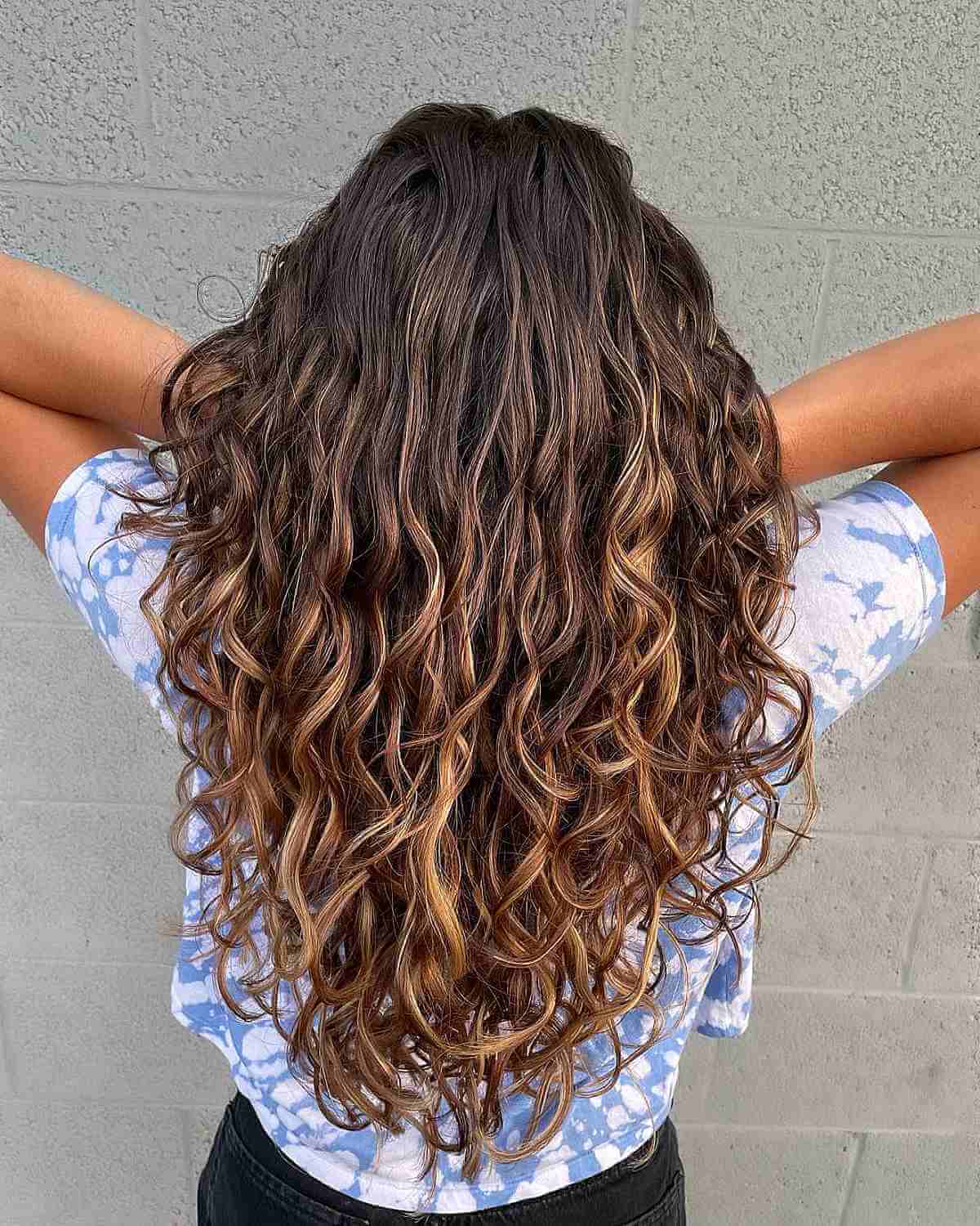 Chunky Blonde Highlights on Curly Light Brown Hair