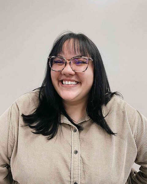 A Classic Bangs for Black Medium-Length Hair and Round-Shaped Faces with Glasses