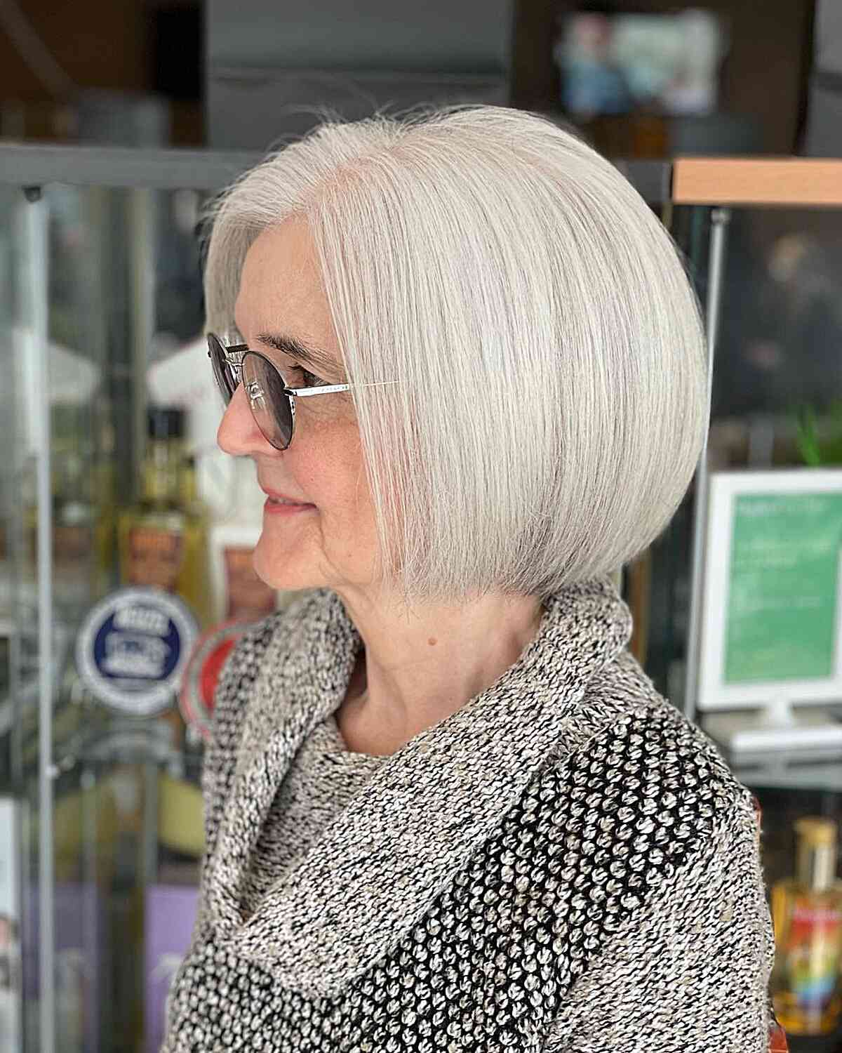 Classic Chin-Length Round Bob with Thinner Ends on Older Women Over Sixty with White Hair