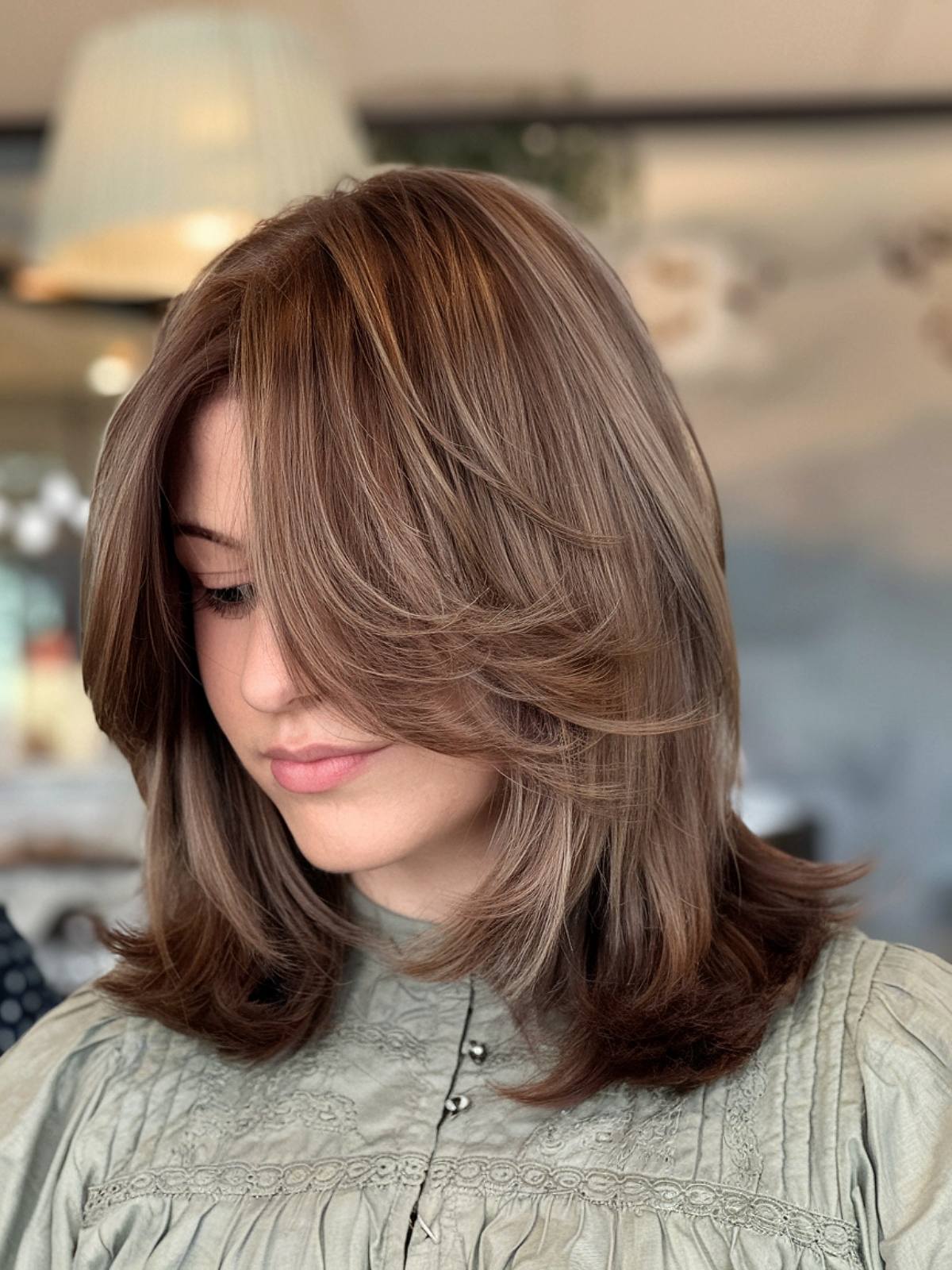 Medium length hair with layers for added dimension