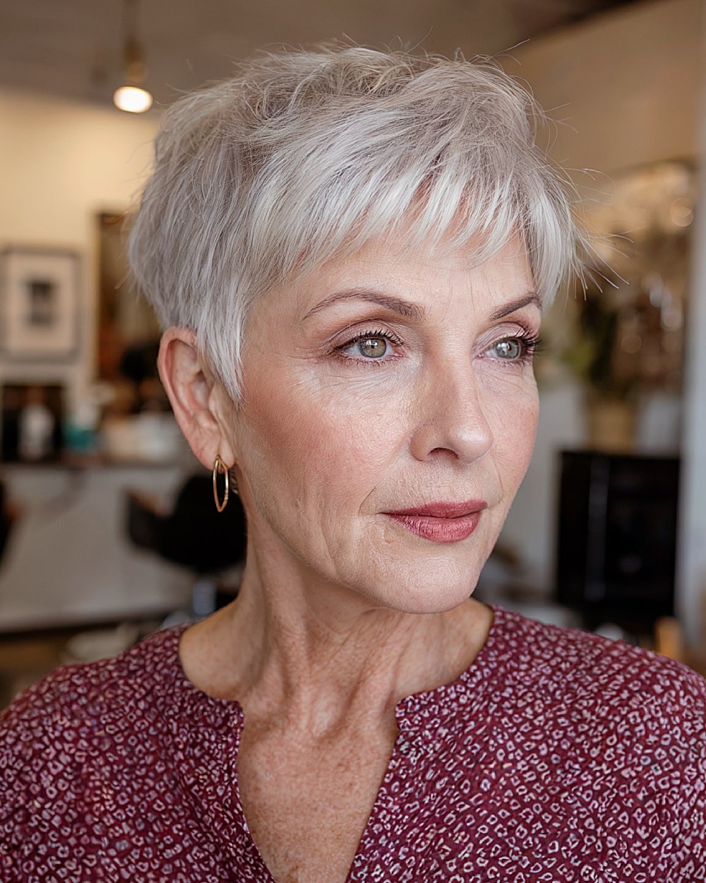 Textured pixie cut with side part and short fringe for women over 60