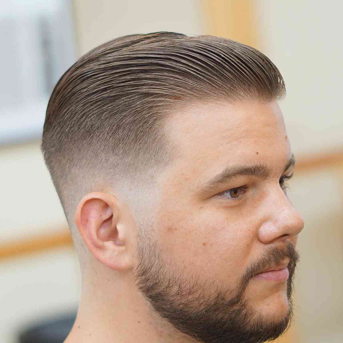 Clean-Cut Slicked Back Tapered Haircut