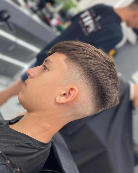 A Clean Fade with a Textured Top