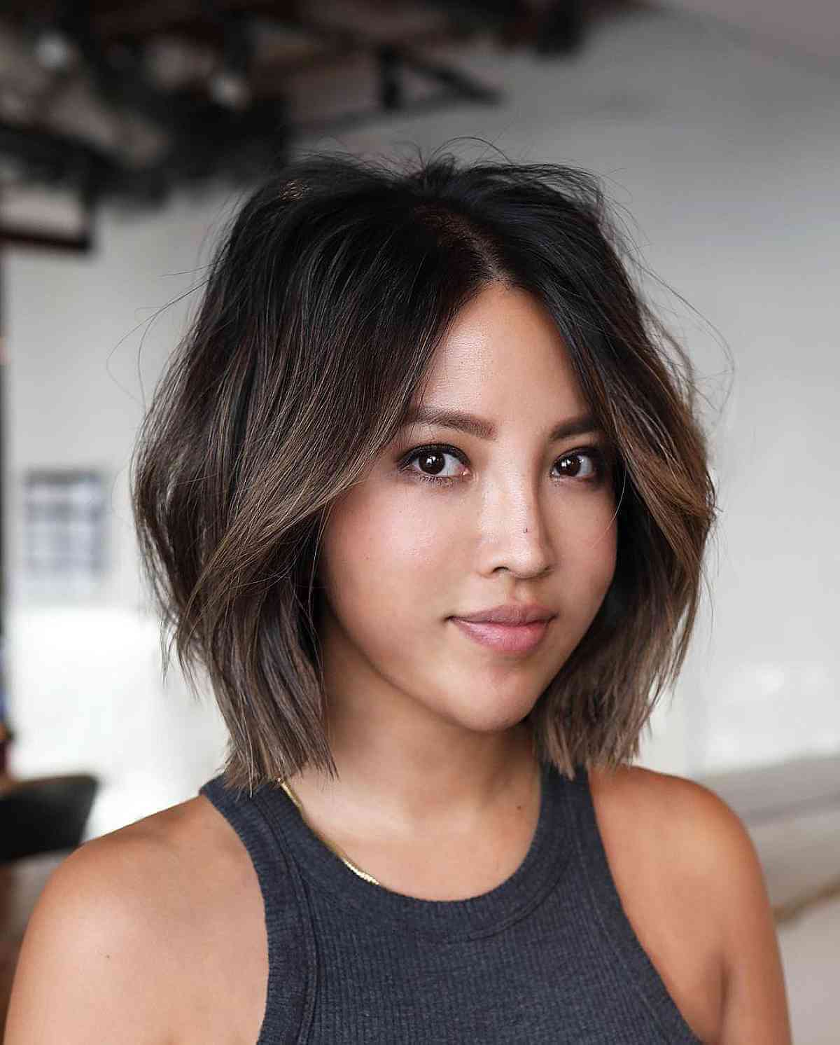 Cool Blunt Middle-Part Bob for Long Faces