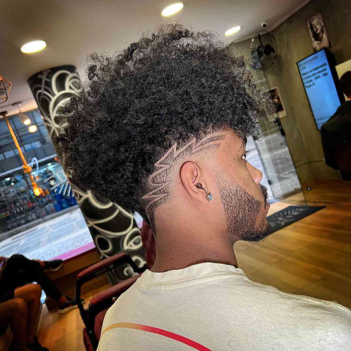 Cool Designs with a Curly Top and an Undercut for Men
