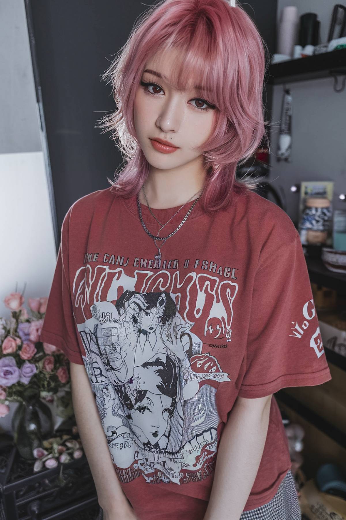 Layered Japanese-inspired emo haircut with pastel pink hues and soft curtain bangs