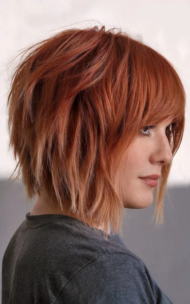 A Copper blunt bob with fringe