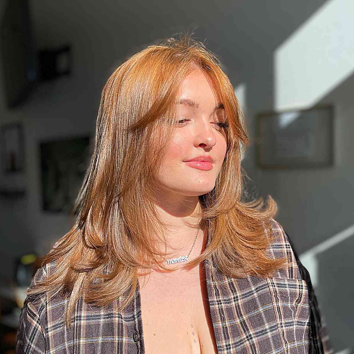 Copper Feathered Layers and Curtain Fringe on Medium-Length Fine Hair