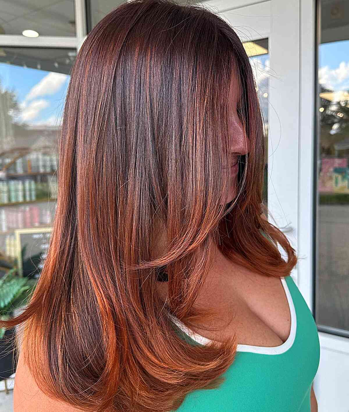 Medium-Length Copper Hair with Lighter Ends for Fall and Mature Ladies Aged 40