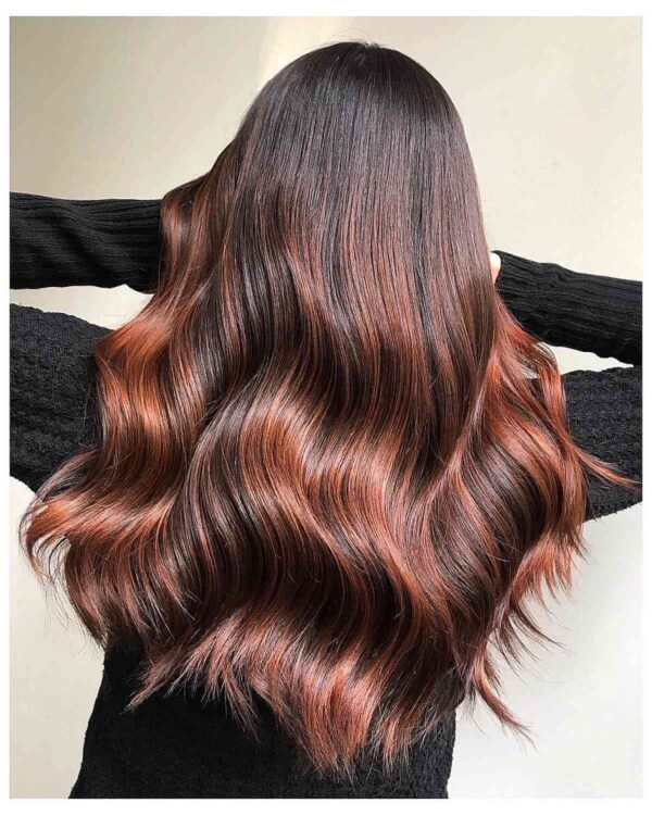 A Copper Highlights and Red Balayage Hair