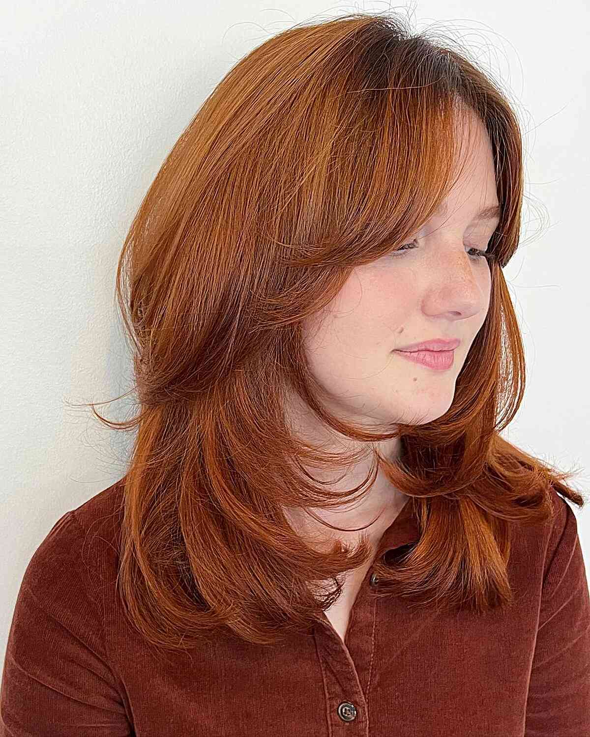 Medium-Length Copper Red Butterfly Cut with Feathery Layers