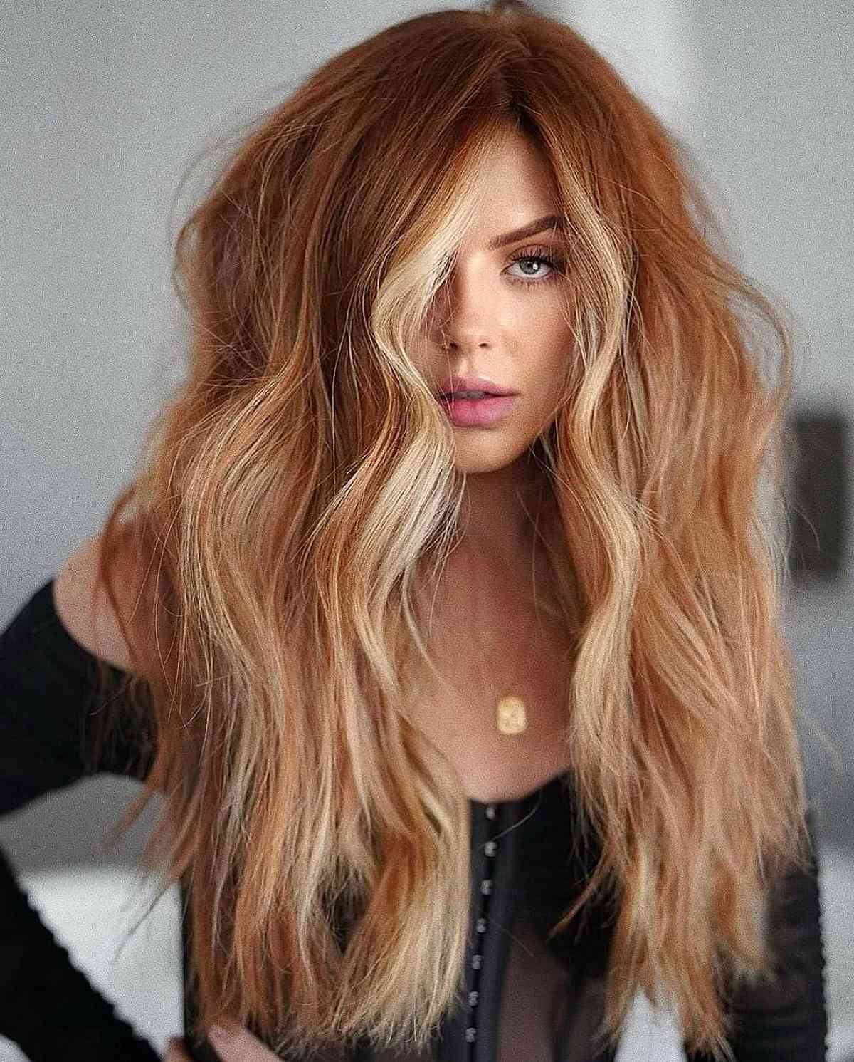 Coppery Long Fluffy Hairstyle with a Blonde Money Piece
