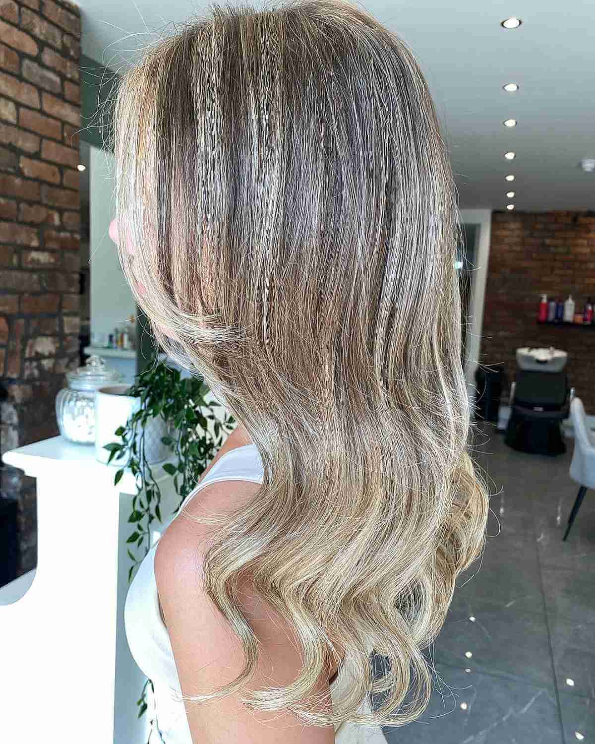 Cream Medium Blonde Balayage with a Face Frame for Thin Hair