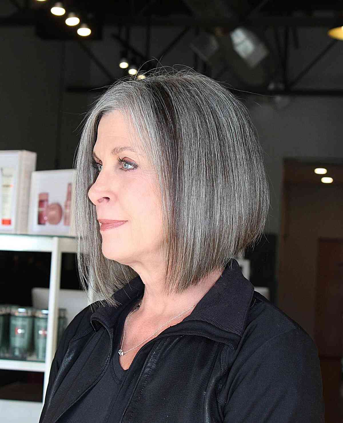 Crisp Angled Bob with Natural Color for older women embracing their aging hair