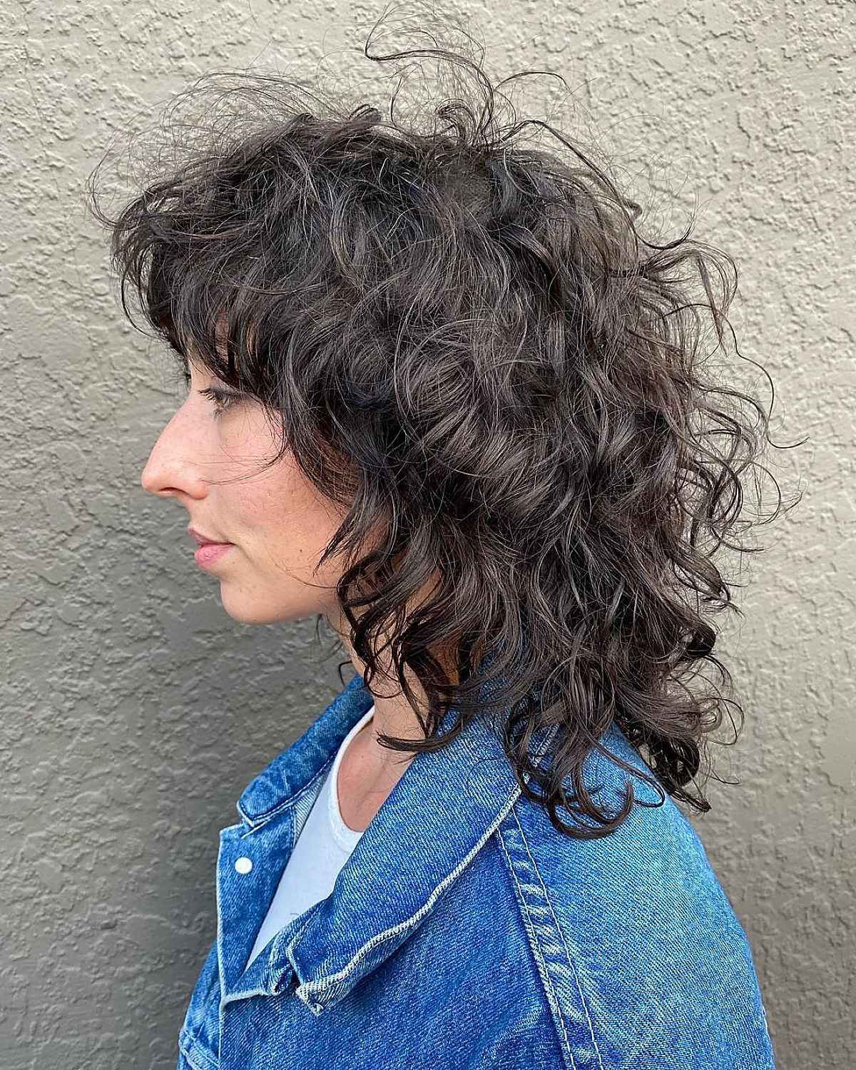 Curled Wolf Cut with a Tousled Texture