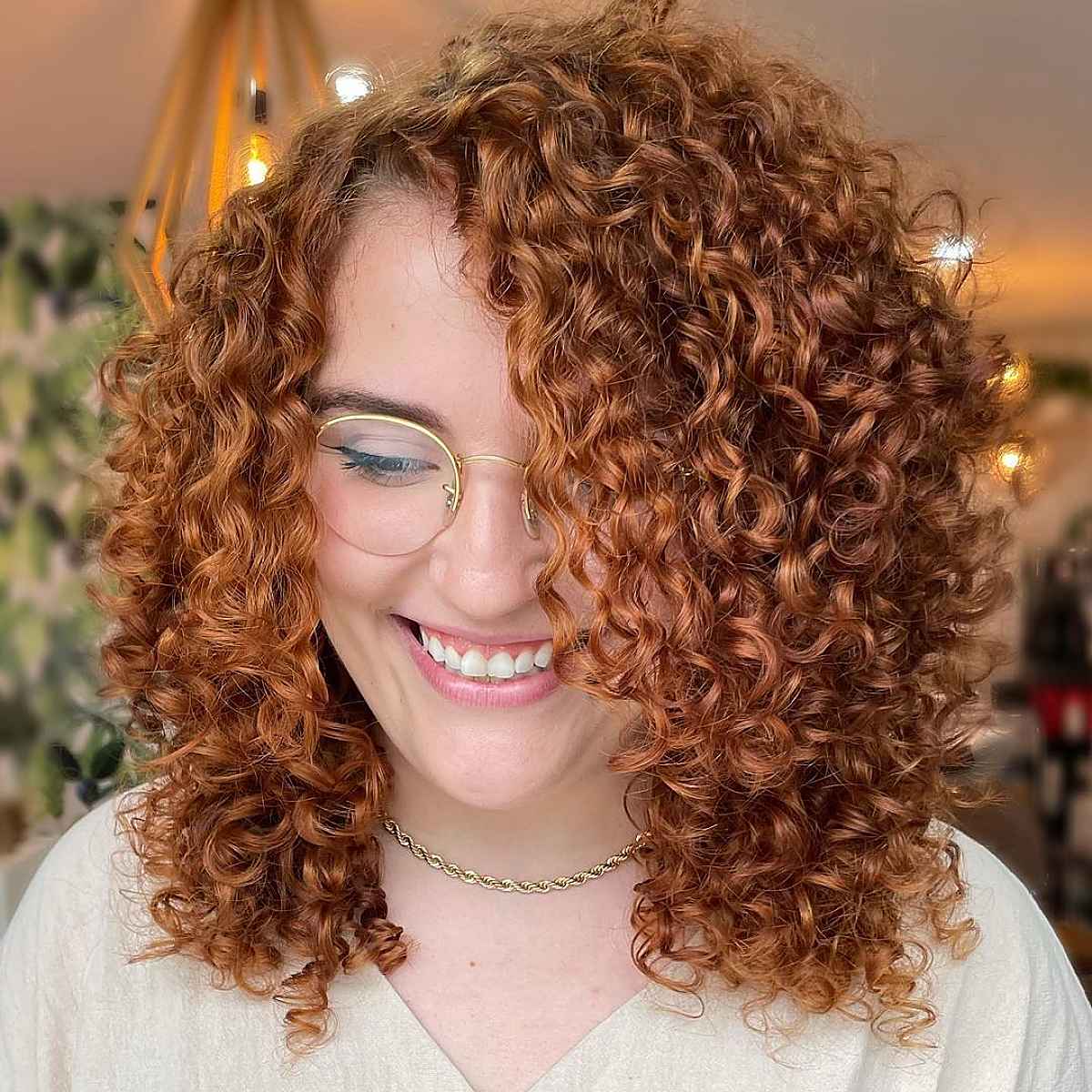 curly and thick shoulder-length hair