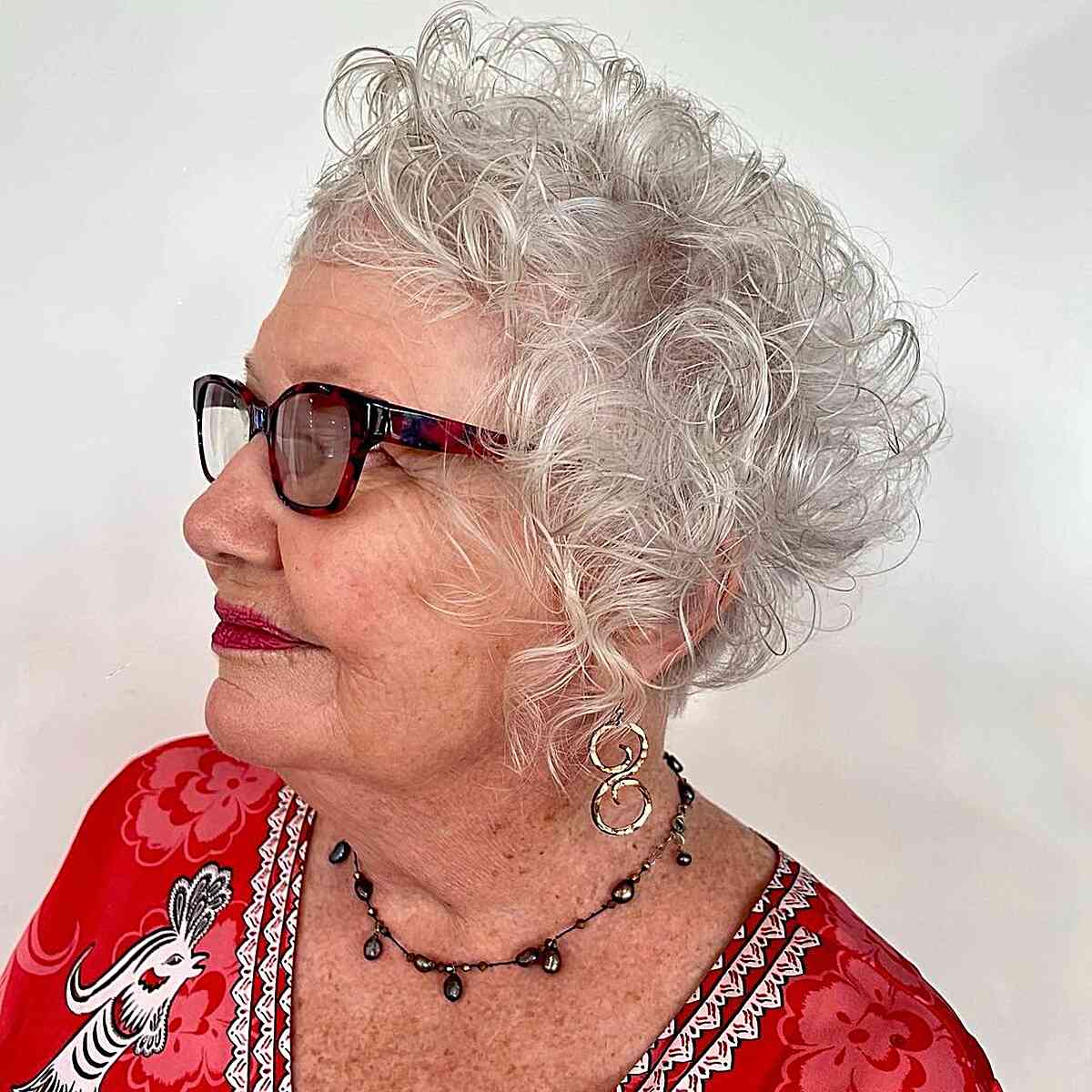 Curly Asymmetric Graduation for 60-Year-olds with thin hair and eyeglasses