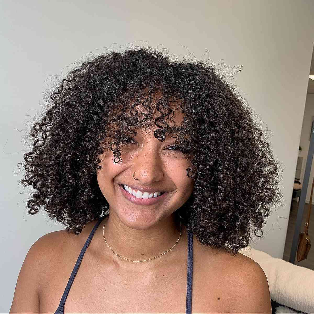 Curly Bangs for Black Women with Shoulder-Length Hair