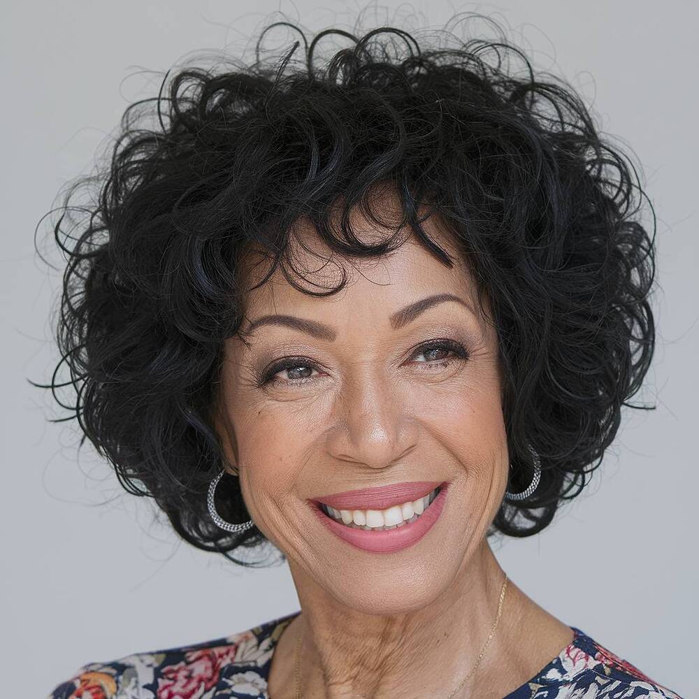 Curly bob haircut for natural texture, enhancing volume and definition for women over 60