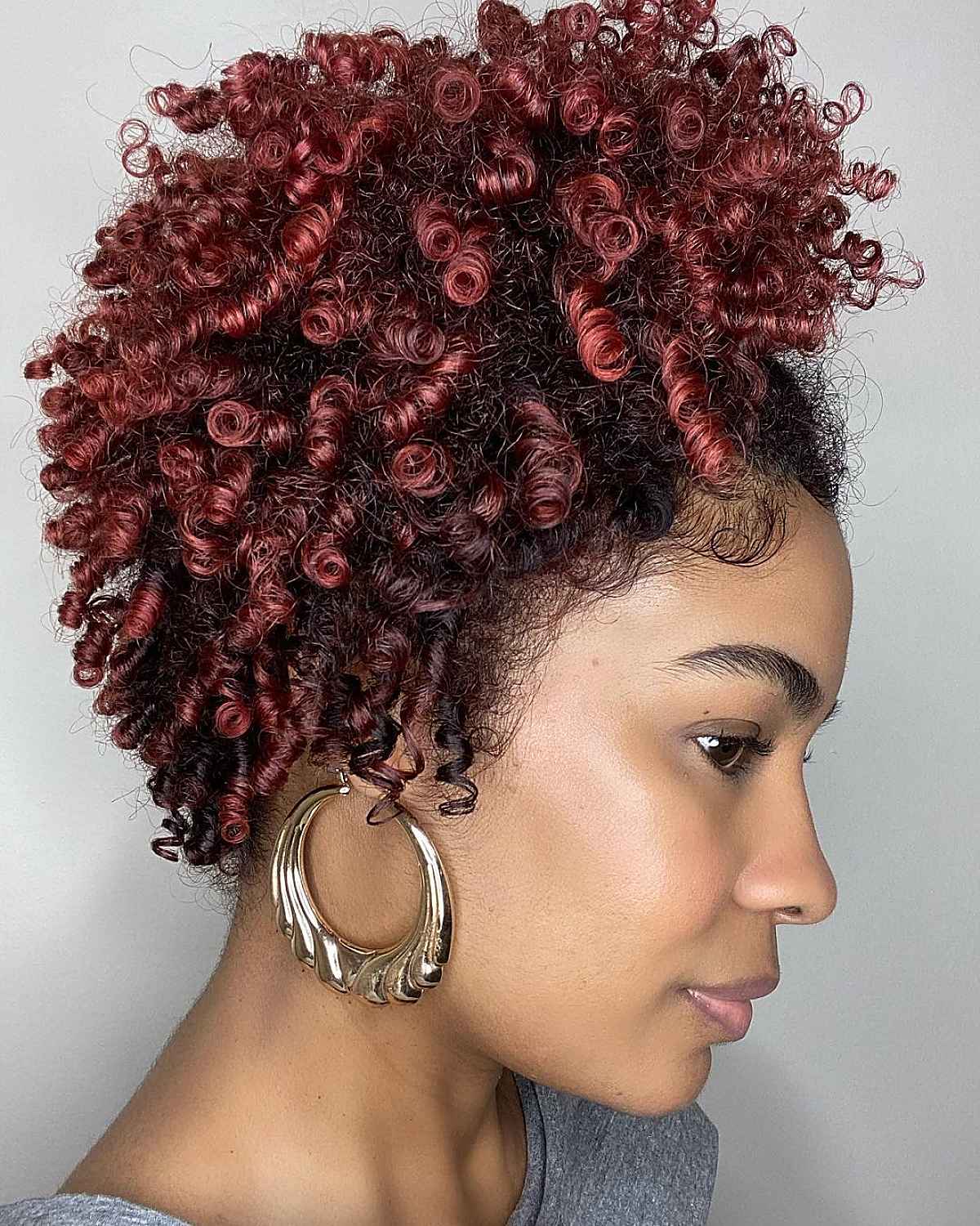 Modern Curly Brown Hair with Red Highlights