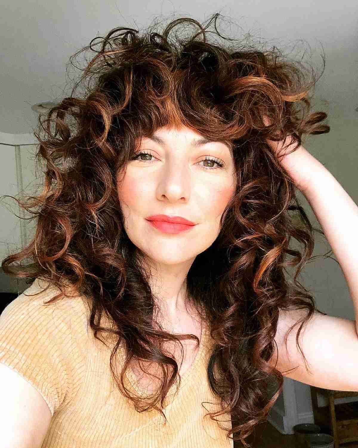 Lived-In Curly Curtain Bangs