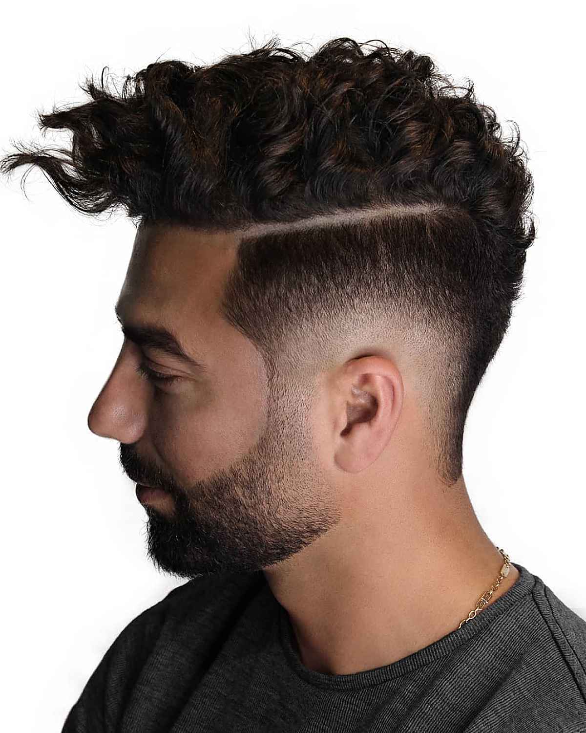 Curly drop fade with part