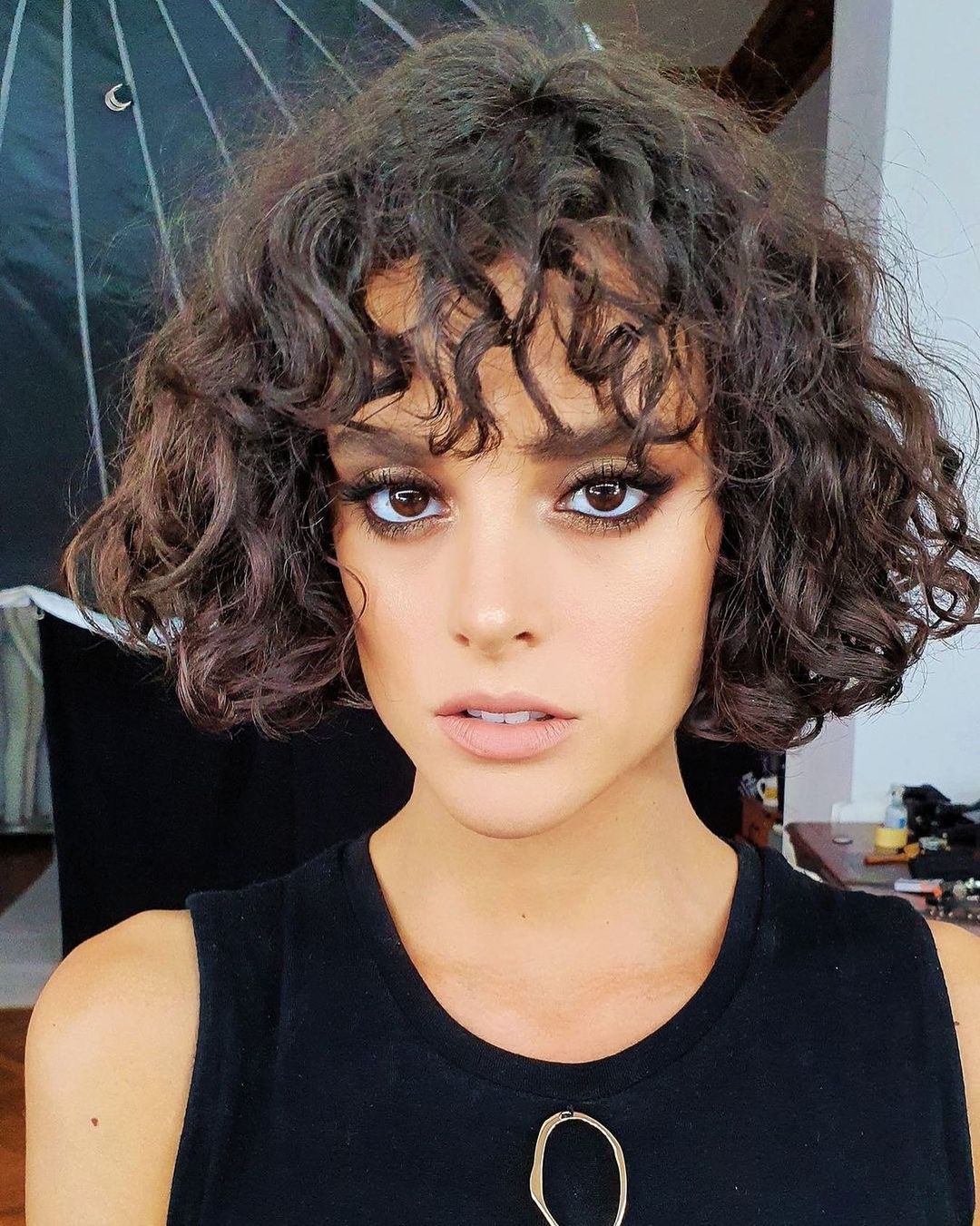 Messy Curly French Bob with Bangs