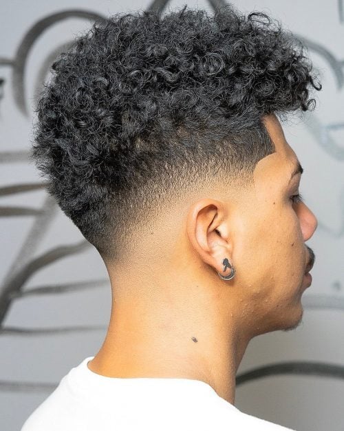 Natural Curly Hair with a Clean Drop Low Taper Fade