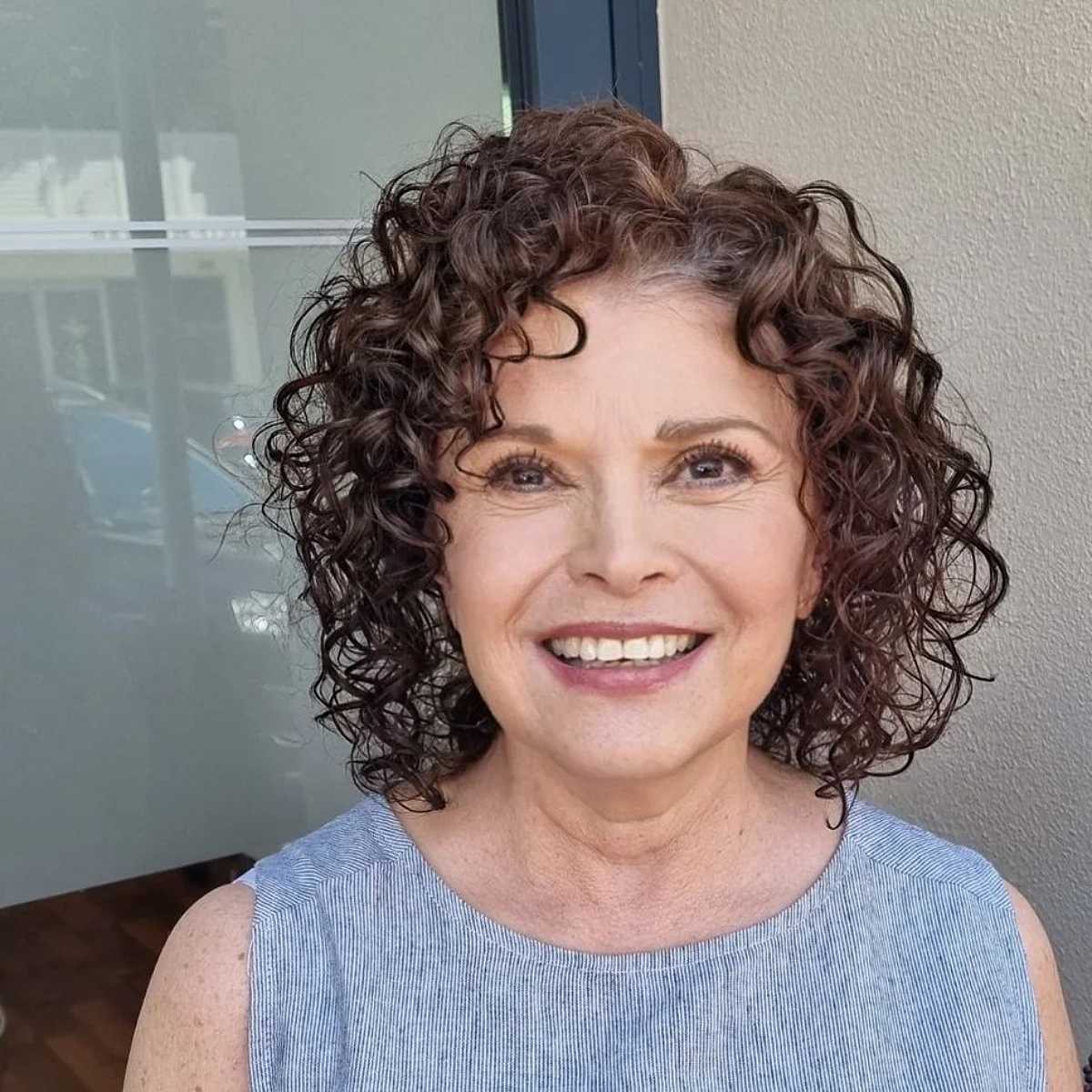 Curly haircut for fabulous women over 60