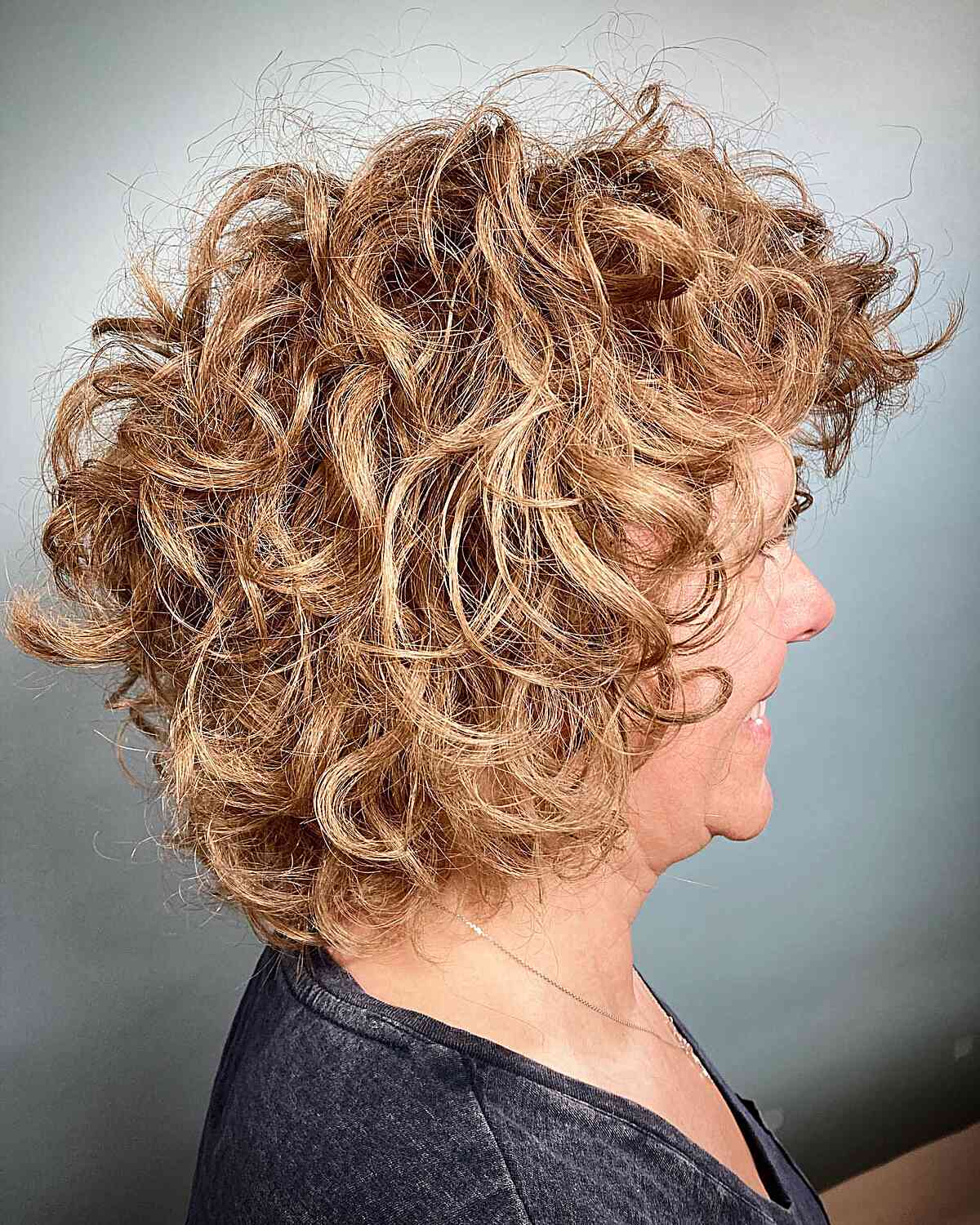 Short-Length Curly Layered Cropped Bob for 60-year-Old Ladies