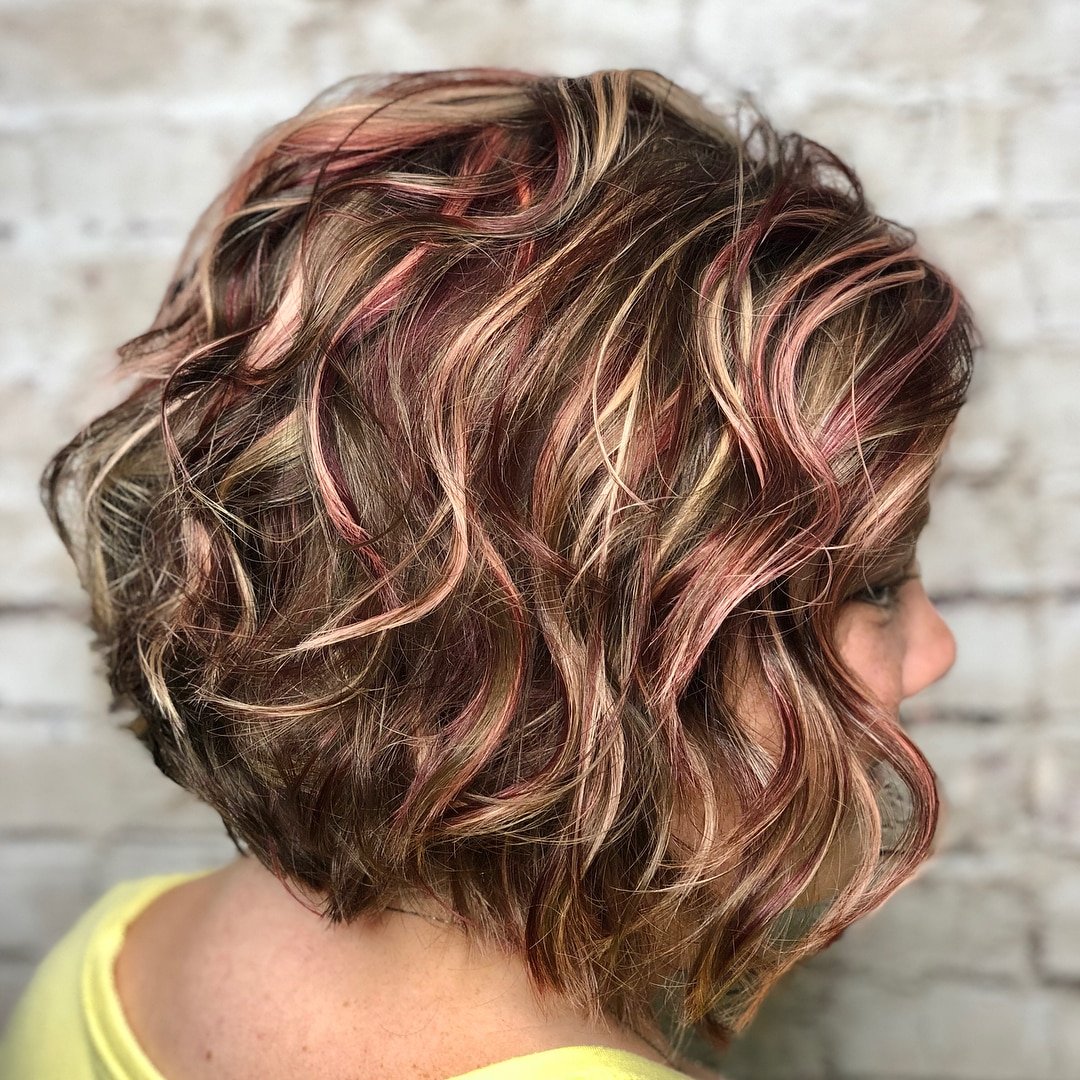Curly Light Brown Hair with Highlights