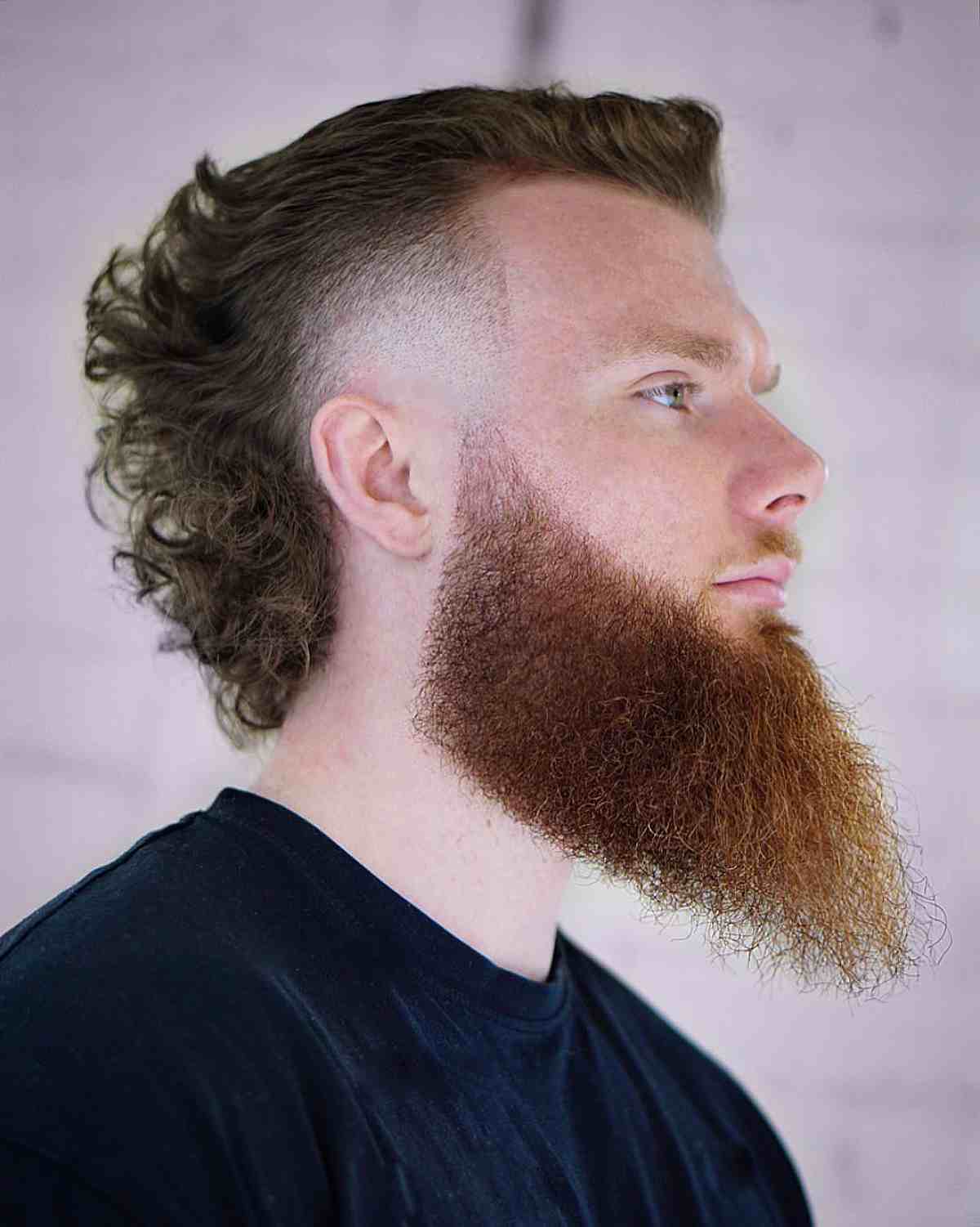 Curly Mullet Mohawk with a Beard for Guys