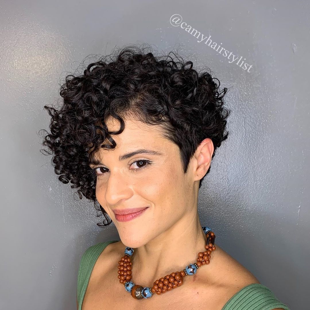 curly pixie bob with long curly bangs